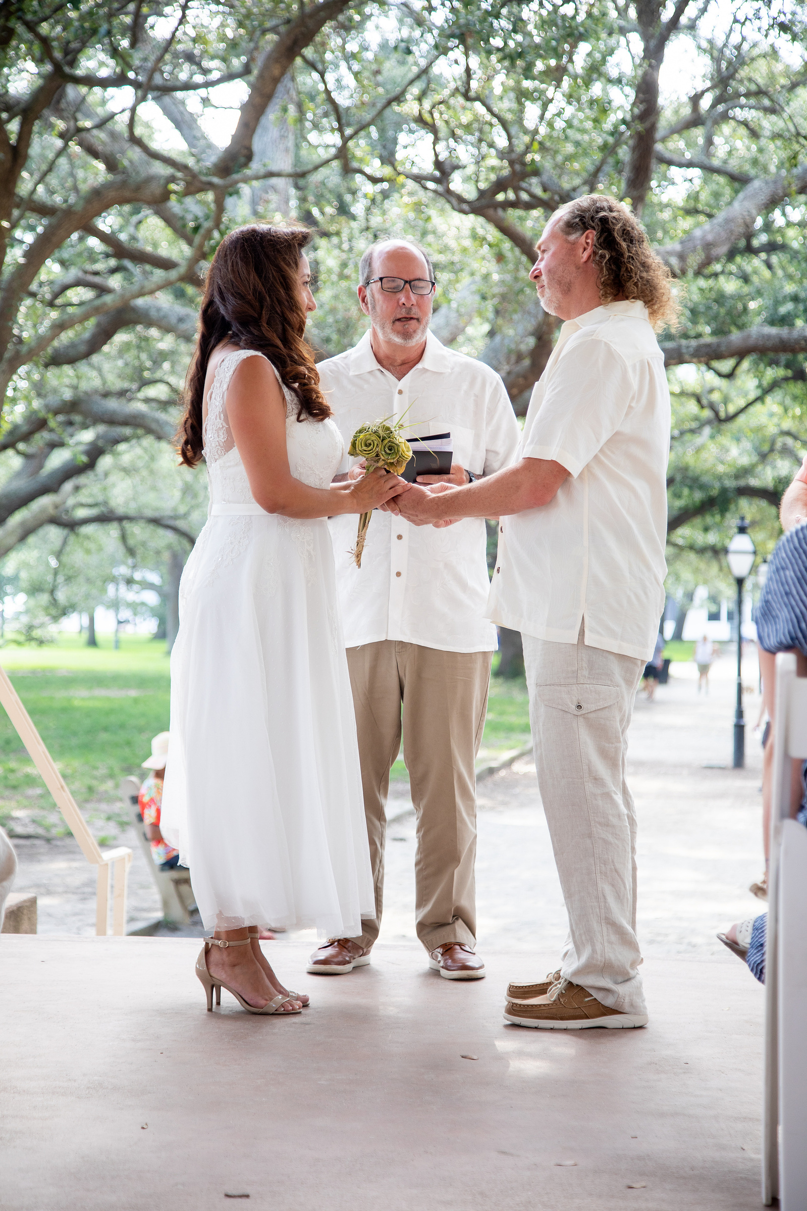 charleston, battery park, couple, formal photo poses, smiling, laughter, a couple in love. intimate ceremony, outdoors
