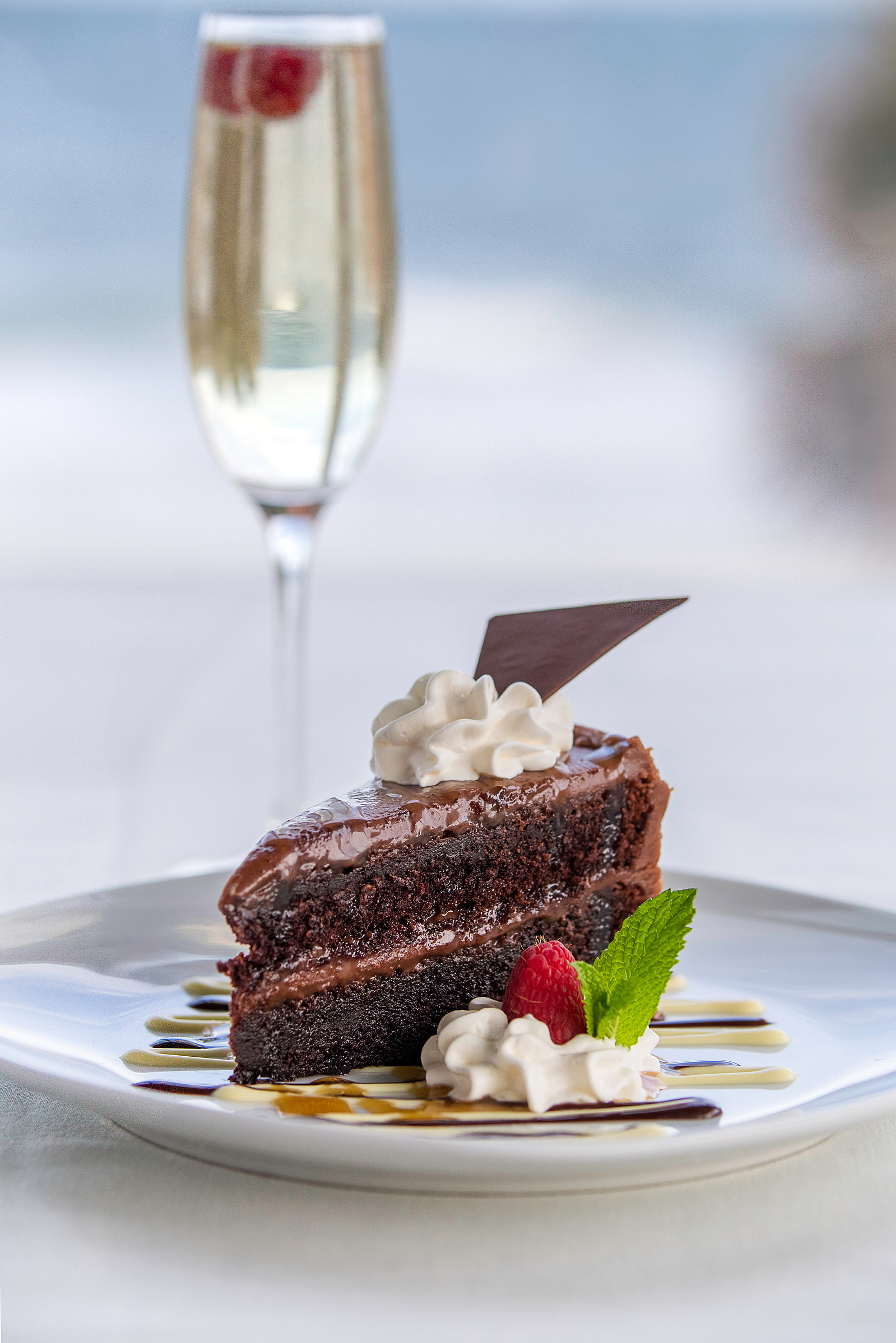 chocolate cake, mint, champagne, desert. whipped cream