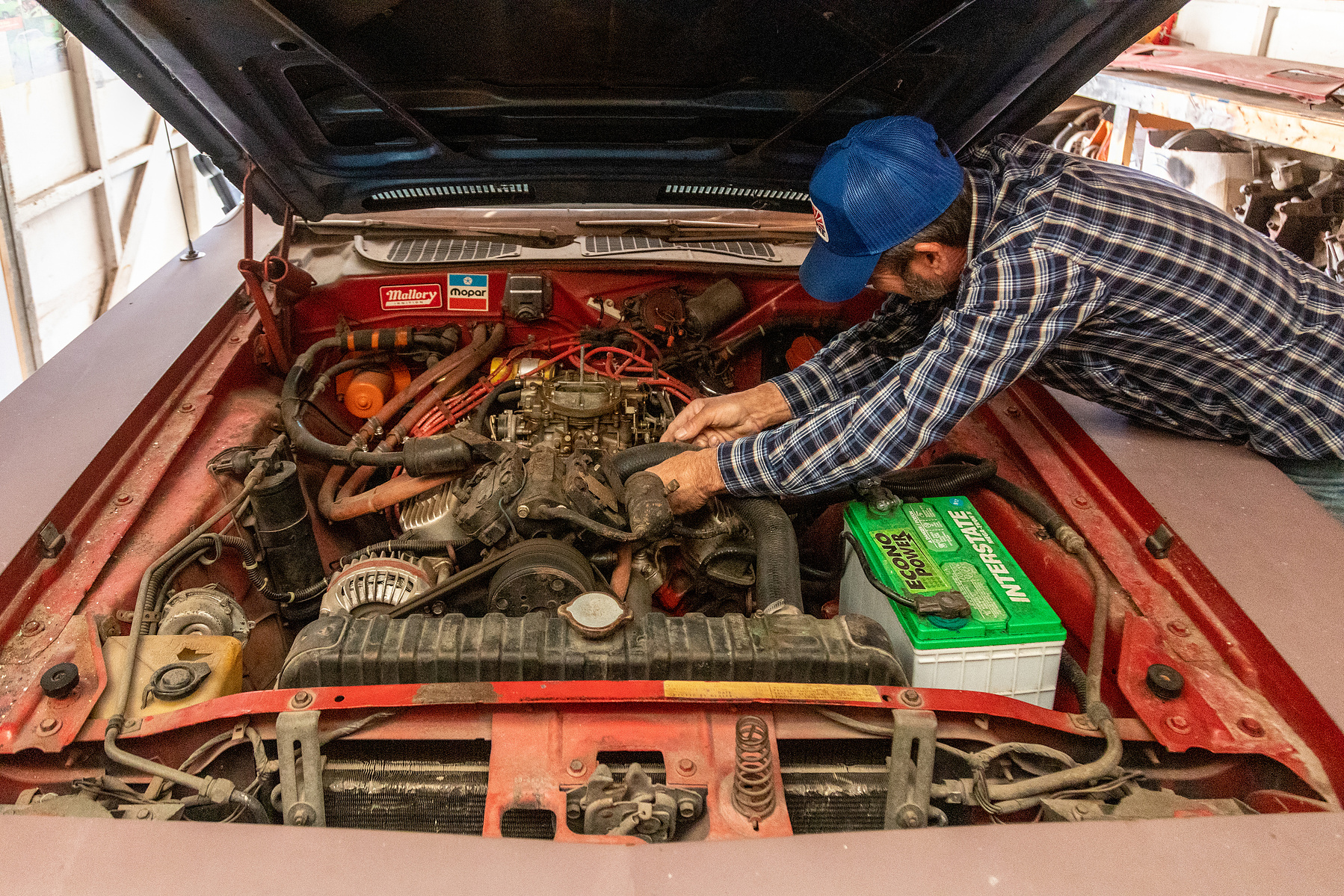 red, vintage muscle car, man, hands, texas