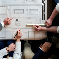 JAW Architects designing a building blueprint photography by Amber Shumake studio photographer