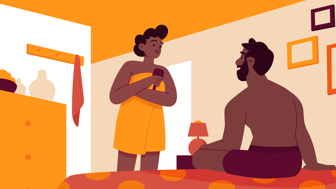 In bedroom, woman in a towel discusses with man in underpants sitting on a bed.