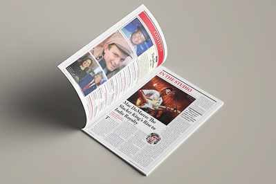 Magazine on table opening to first page with the table of contents on the left and the opening page of the first article on the right.