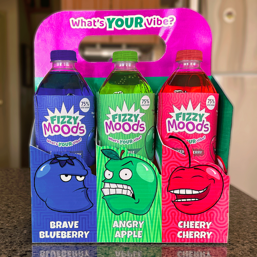 Variety pack on kitchen counter displaying the flavours Brave Blueberry, Angry Apple, and Cheery Cherry. Tagline, "What's your vibe?" is placed along the handle.