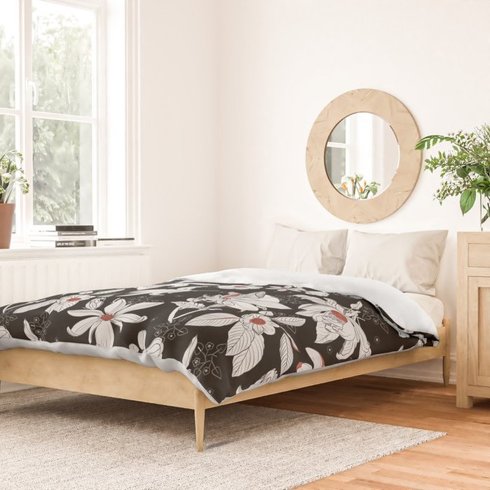 artist-designed unique home decor and bedding in graphic black and white floral pattern with red accent. 