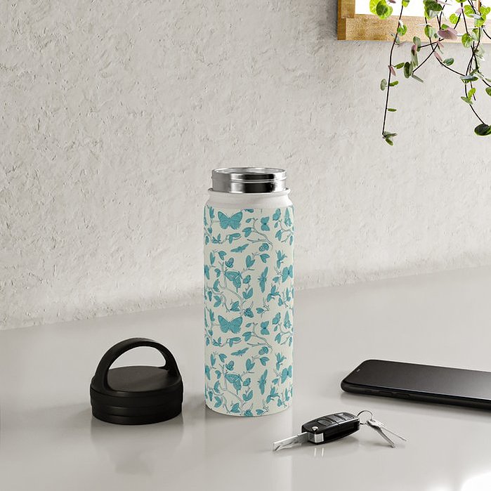delicate robins egg blue floral pattern with illustrated butterflies. 