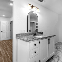 Photos of bathroom in House Near Anton, Texas with lots of Black and Whites
