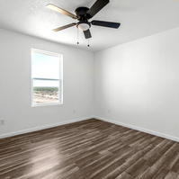Photos of bedroom in House Near Anton, Texas with lots of Black and Whites