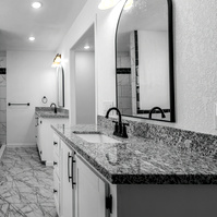 Photos of bathroom in House Near Anton, Texas with lots of Black and Whites