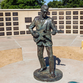 A closer view of the Buddy Holly statue located in Lubbock, Texas at the Buddy Holly center. 