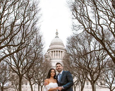 An engaged couple posing at iconic location near Rhode Island State House in Providence. Photography by Ivan Djikaev/Mind On Photography