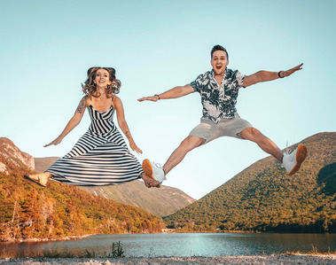 Engagement photography: jump of joy in Franconia Notch, New Hempshire. Photography by Ivan Djikaev/Mind On Photography