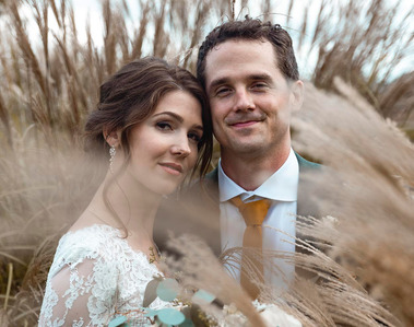 Wedding portrait: a bride and a groom in reeds