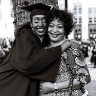 International student hugging her mom during graduation shoot on Northeastern University campus