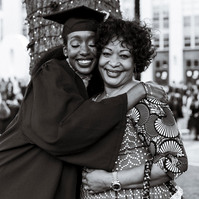 International student hugging her mom during graduation shoot on Northeastern University campus
