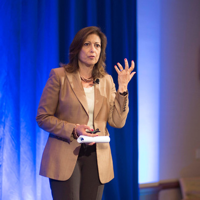 Woman presenting during corporate event in Boston