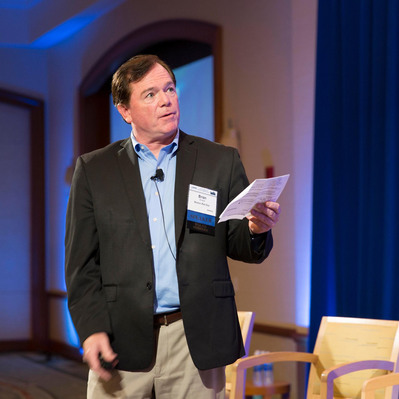 Man presenting during corporate event in Boston