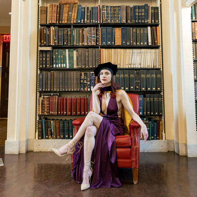 Grad lady in library photo