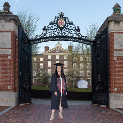 Graduation day professional photo in front of college entrance Cape Cod