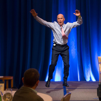 Man presenting during corporate event in Boston