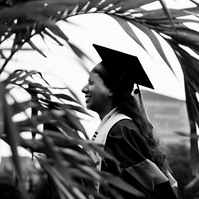 Creative graduate portrait of a woman in Boston Public garden