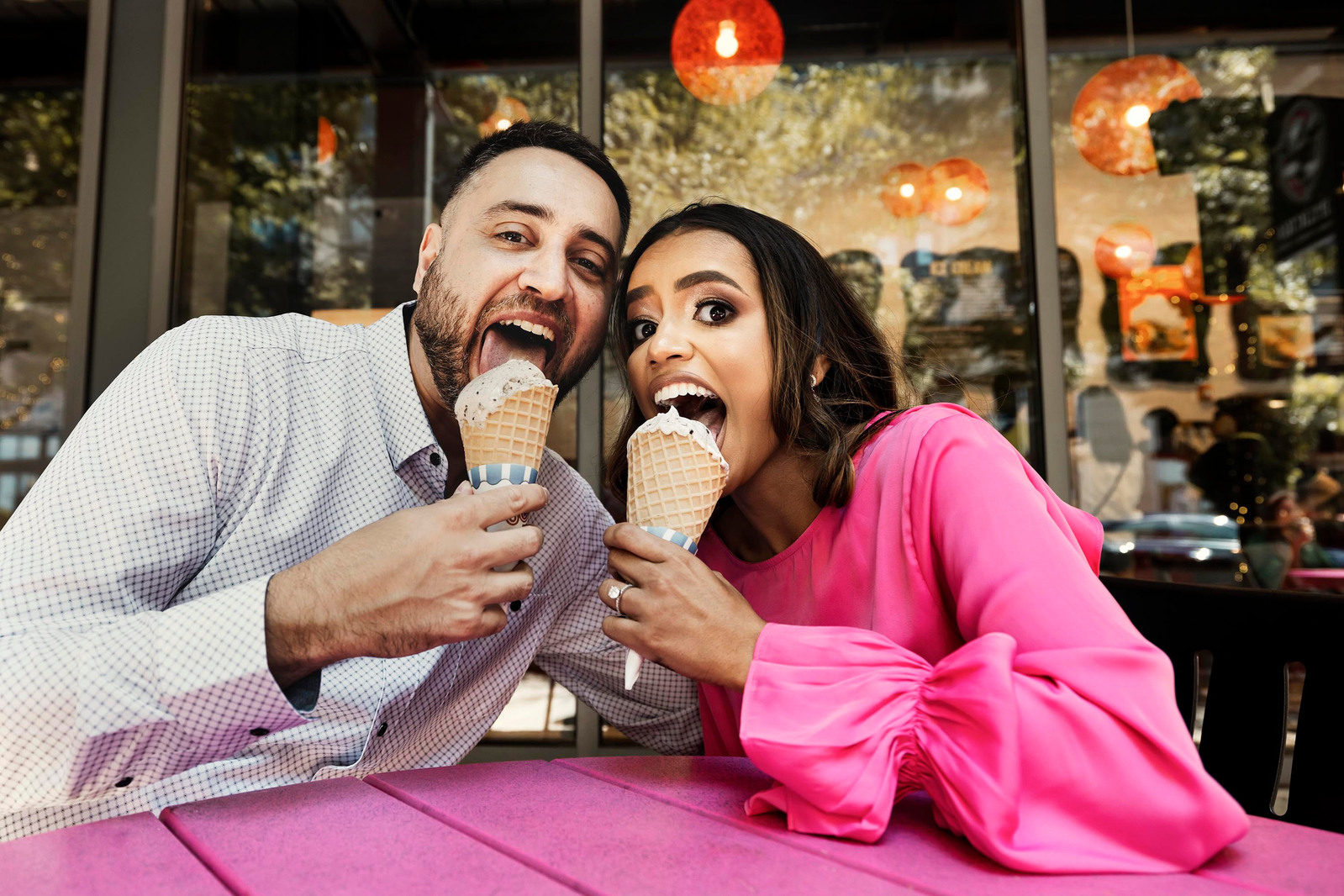 The happiest ever engaged couple enjoying ice cream; photo by couple's photographer Ivan Djikaev / Mind On Photography