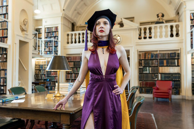Grad lady in library photo