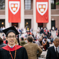 Portrait of a Japanese student graduating from Harvard University