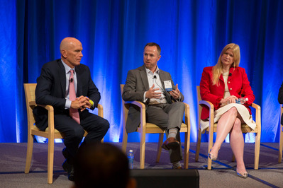 Corporate event with panelists talking in Boston