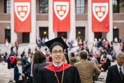 Grad in graduation day Boston