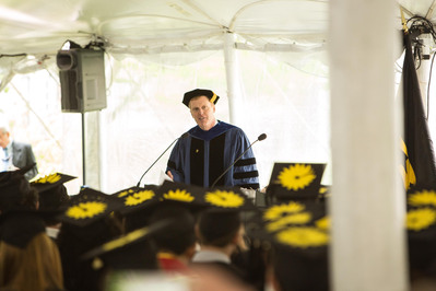 Man speaking to grads photo in Boston