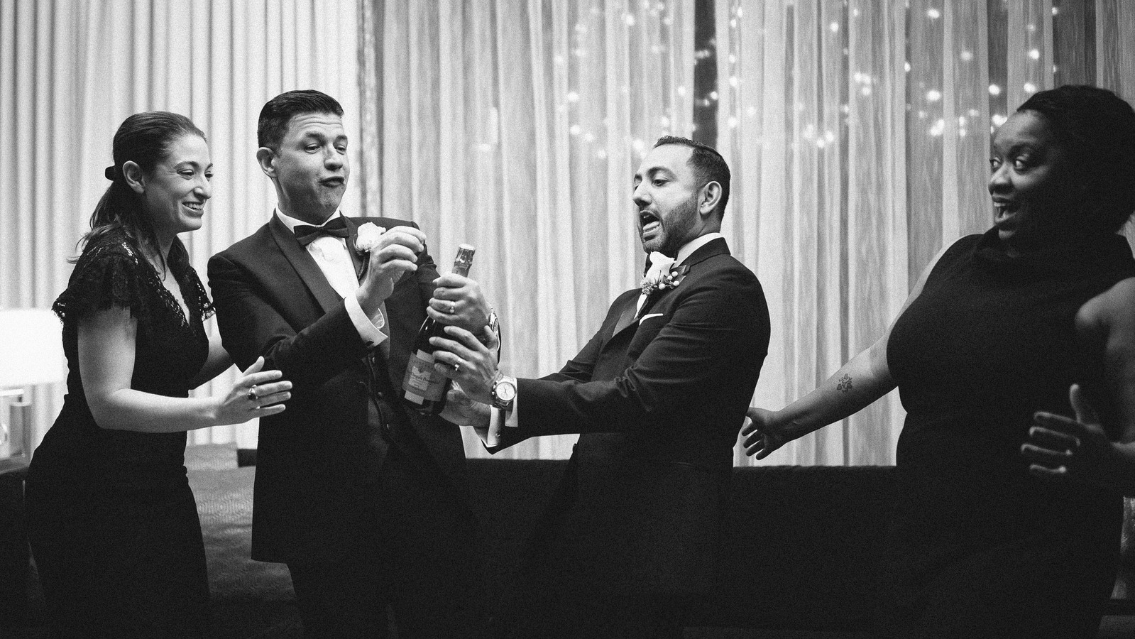 Gay couple celebrating their marriage with two guests. Elopement photographer Ivan Djikaev/Mind On Photography. New England