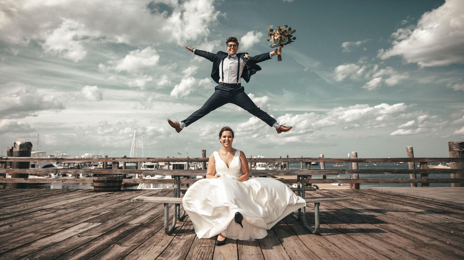 Creative and outstanding wedding photo of a groom jumping over a bride by Ivan Djikaev / Mind On Photography
