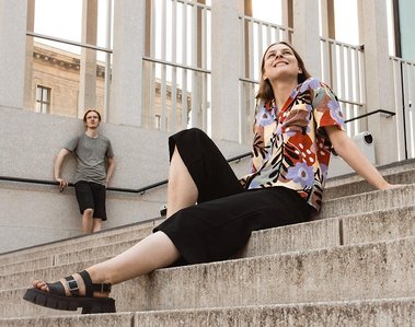 A couple posing for an artistic photo in Berlin, Germany. Photographer Ivan Djikaev/Mind On Photography.