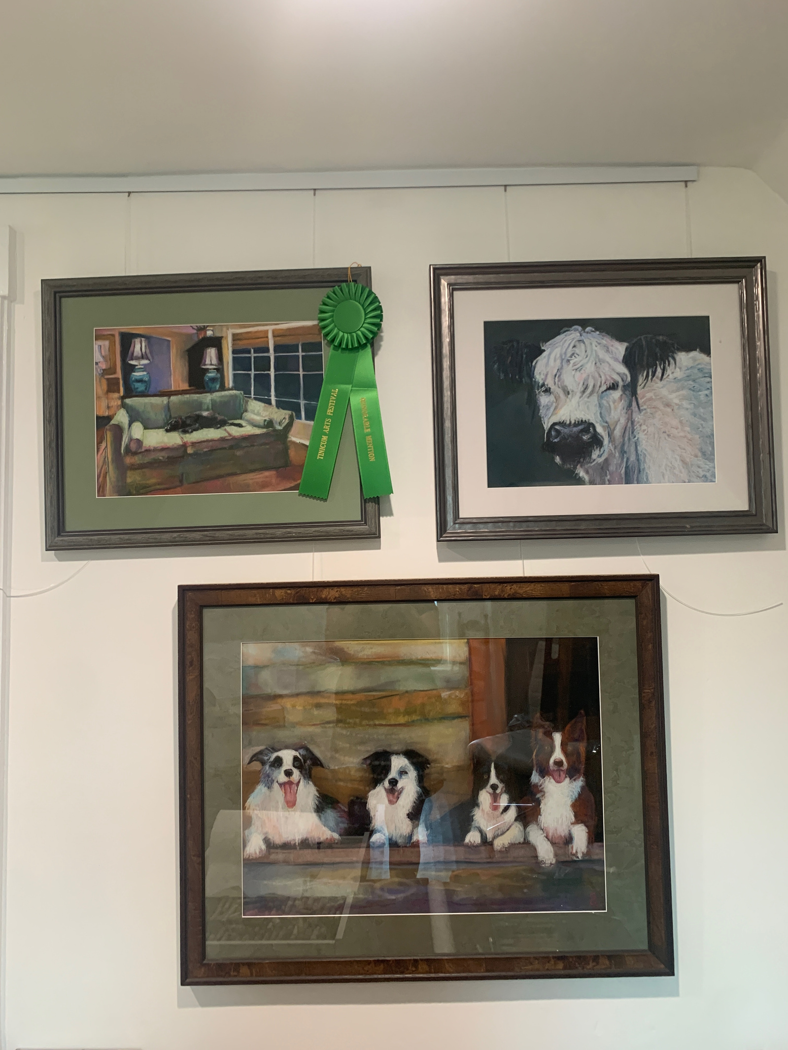 Three pastel paintings of animals, all of which have been exhibited and won awards at Tinicum Civic Association's annual Art Barn exhibit.