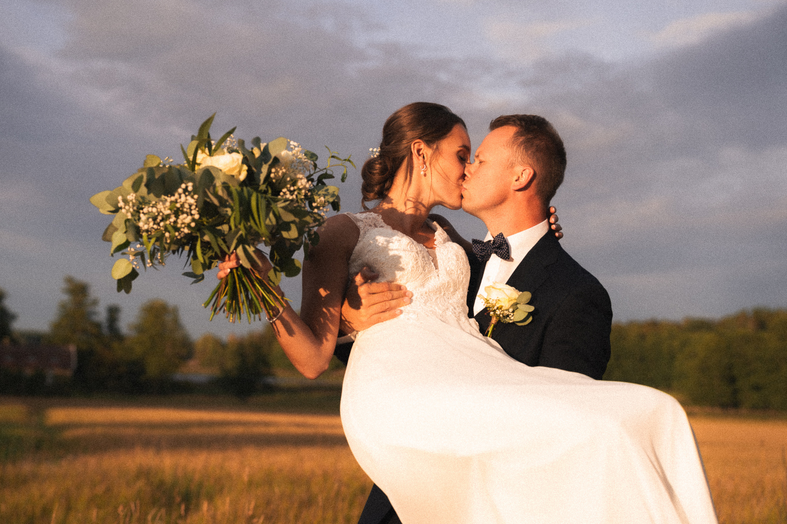 Romantic Wedding Portraits in golden sunset
