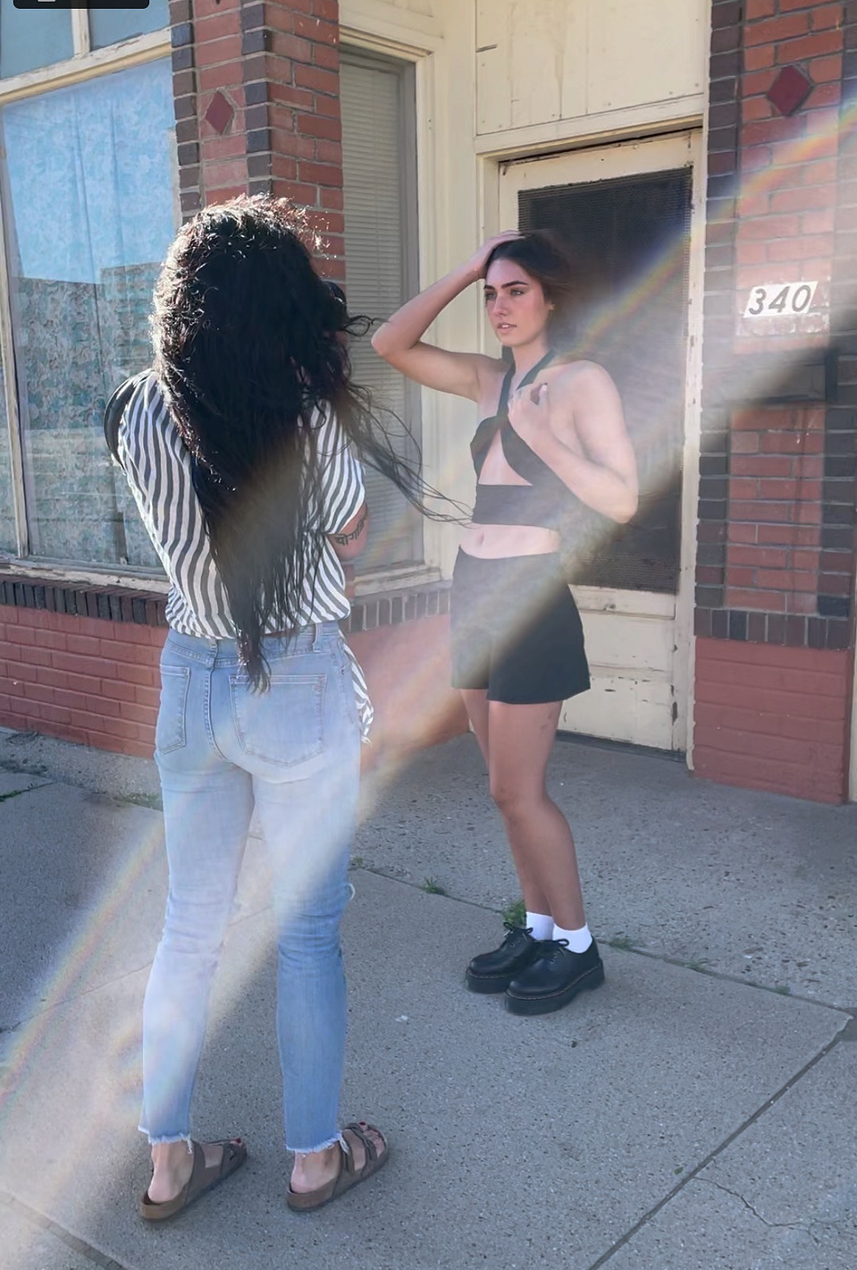 behind the scenes of a senior portrait session with Cari Faye Photography of the white room studios in Casper Wyoming 