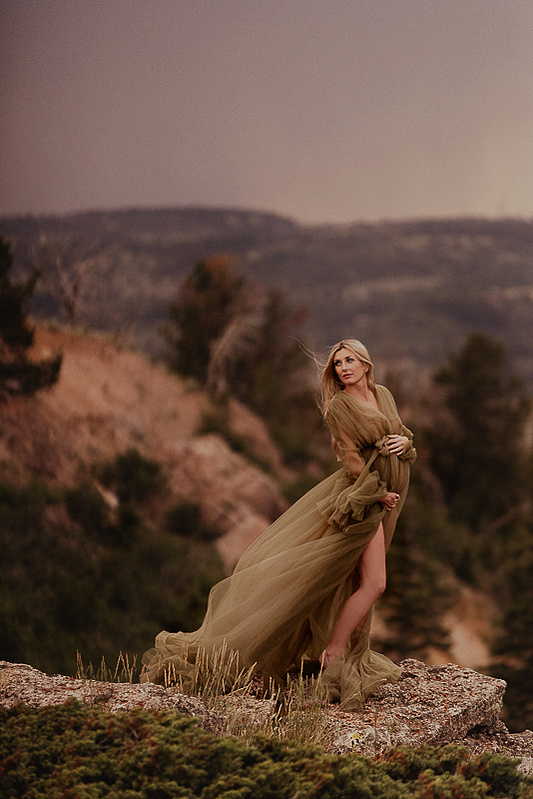 photograph of emmy Voigt of Casper Wyoming maternity portrait photographed by Cari Faye Antonovich of Cari Faye photography and the white room muddy mountain photoshoot