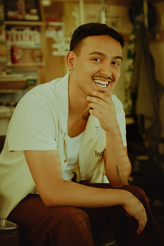 Noah Longchase a high school senior in Casper Wyoming is photographed by Cari Faye Photography of the white room studio. this session was photographed at the Rialto barber shop in Casper Wyoming
