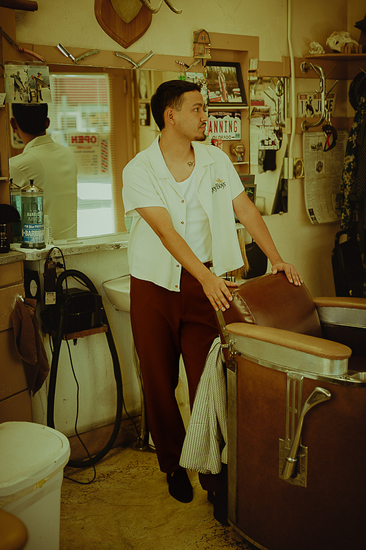 Noah Longchase a high school senior in Casper Wyoming is photographed by Cari Faye Photography of the white room studio. this session was photographed at the Rialto barber shop in Casper Wyoming