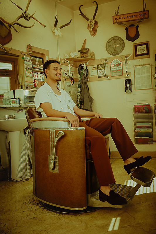 Noah Longchase a high school senior in Casper Wyoming is photographed by Cari Faye Photography of the white room studio. this session was photographed at the Rialto barber shop in Casper Wyoming