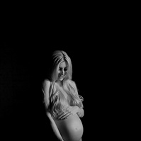 photograph of emmy Voigt of Casper Wyoming maternity portrait photographed by Cari Faye Antonovich of Cari Faye photography and the white room