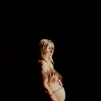 photograph of emmy Voigt of Casper Wyoming maternity portrait photographed by Cari Faye Antonovich of Cari Faye photography and the white room