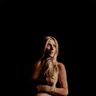 photograph of emmy Voigt of Casper Wyoming maternity portrait photographed by Cari Faye Antonovich of Cari Faye photography and the white room