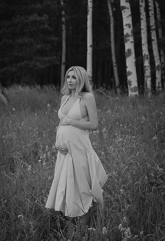 photograph of emmy Voigt of Casper Wyoming maternity portrait photographed by Cari Faye Antonovich of Cari Faye photography and the white room casper mountain photoshoot 