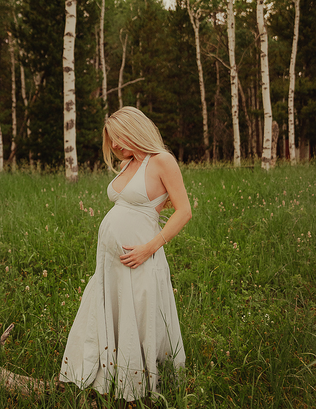photograph of emmy Voigt of Casper Wyoming maternity portrait photographed by Cari Faye Antonovich of Cari Faye photography and the white room casper mountain photoshoot 
