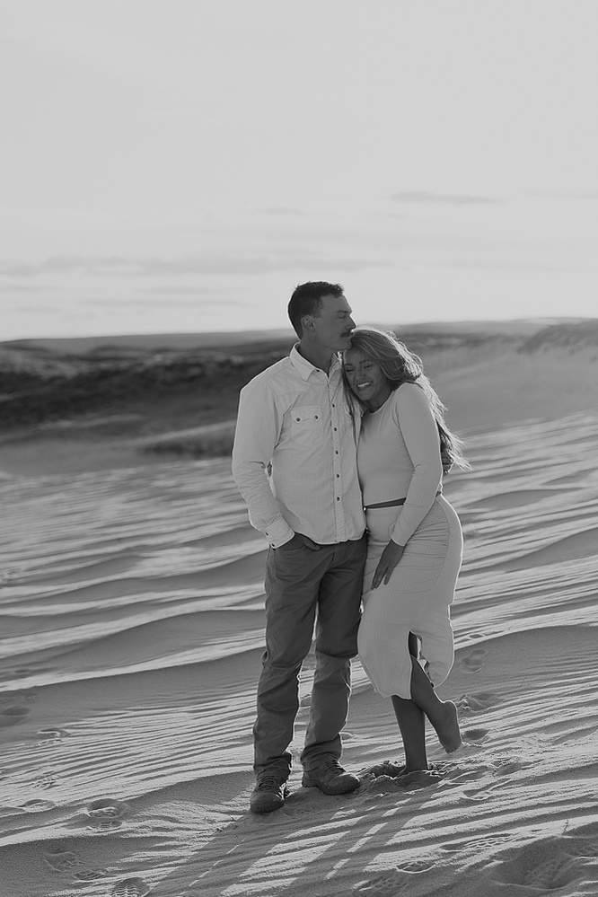 Portrait Photography by Cari Faye Antonovich in Casper, Wyoming, couples Photography by Cari Faye in Casper, Wyoming, engagement photography by Cari Faye in casper, wyoming, family photography by Cari Faye in casper, wyoming, seminoe sand dunes