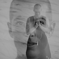 a black and white image of buddhist monk photographed by Cari Faye Antonovich of The White Room Studios at the Seminoe sand dunes near Rawlins Wyoming at sunset