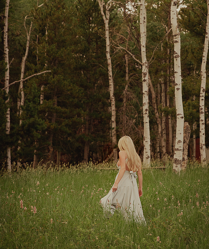 photograph of emmy Voigt of Casper Wyoming maternity portrait photographed by Cari Faye Antonovich of Cari Faye photography and the white room casper mountain photoshoot 