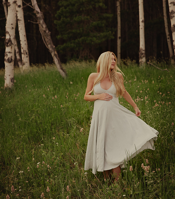 photograph of emmy Voigt of Casper Wyoming maternity portrait photographed by Cari Faye Antonovich of Cari Faye photography and the white room casper mountain photoshoot 