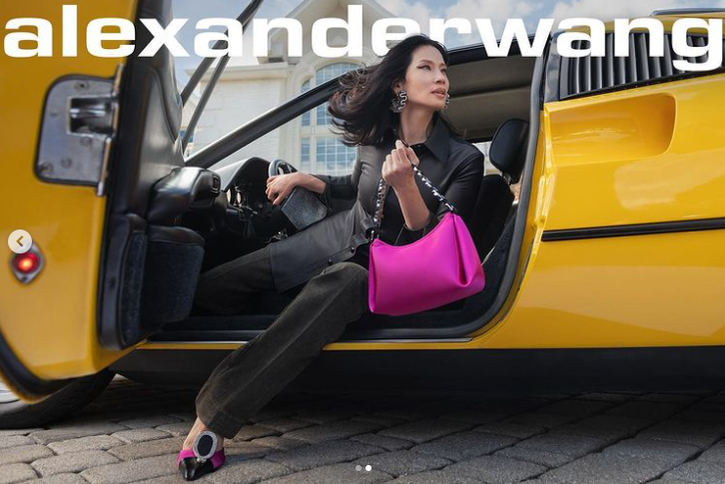 Lucy Liu wears Lycra shirt with crystal cuff in Alexander Wang Resort 22 campaign.